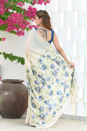 Off white color soft modal silk saree with weaving work