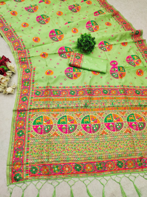 Pista green color pushmina silk saree with weaving work