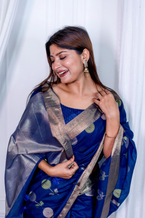 Navy blue color soft linen silk saree with jamdani woven design