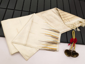 Off white color soft tussar silk saree with zari woven work