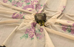 Cream color soft muga silk saree with floral weaving work