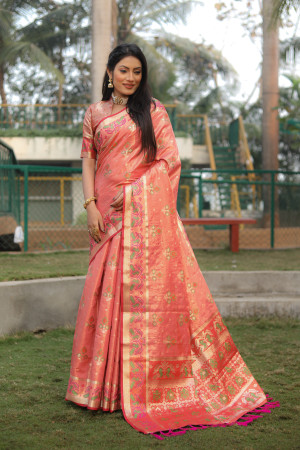 Peach color soft organza silk saree with patola woven design