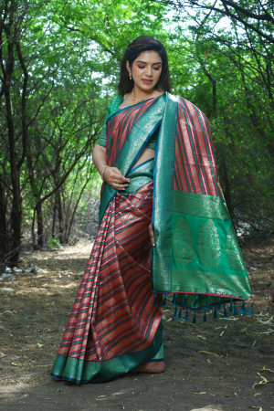 Pink color soft leheriya silk saree with zari weaving work