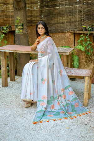 Orange color soft muga silk saree with floral weaving work