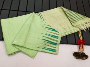 Pista green color soft tussar silk saree with zari woven work