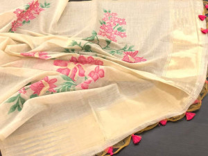 Off white color soft muga silk saree with floral weaving work