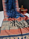Navy blue color tussar silk weaving saree with ikkat woven border & zari woven pallu