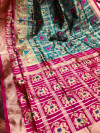Rama green color patola silk saree with weaving work