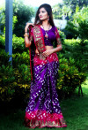 Purple color hand bandhej bandhani saree with zari weaving border