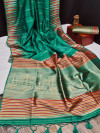 Green color tussar silk weaving saree with ikkat woven border & zari woven pallu