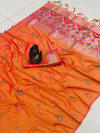 Orange color lichi silk saree with attractive silver zari weaving work