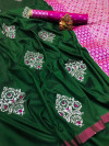 Dark green color soft lichi silk saree with zari weaving work