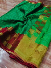 Green color kora muslin silk saree with rich pallu