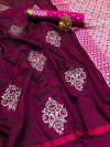 Magenta color soft lichi silk saree with zari weaving work