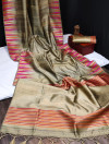 Beige color tussar silk weaving saree with ikkat woven border & zari woven pallu