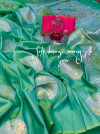 Perrot green color banarasi silk jacquard weaving saree with rich pallu