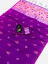 Purple color lichi silk saree with attractive silver zari weaving work