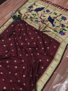 Maroon color paithani silk saree with zari weaving attractive pallu