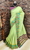 Pista green color linen silk saree with flowery weaving border