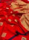 Red color banarasi silk saree with zari weaving work