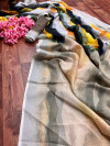 Multi color linen silk saree with silver zari border