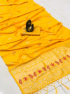 Yellow color lichi silk saree with silver zari weaving work