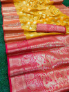 Yellow color banarasi soft silk saree with rich pallu