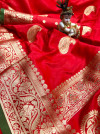 Red color banarasi lichi silk saree with golden zari & rich pallu