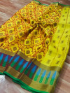 Yellow color kora muslin silk saree with rich pallu
