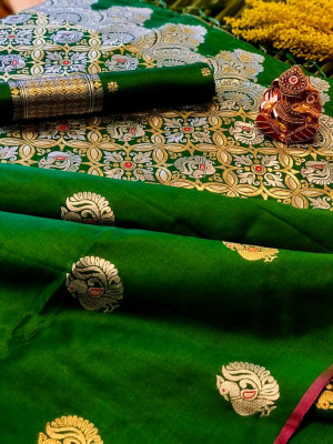 Green color soft banarasi silk saree golden and silver zari weaving work