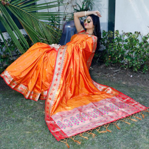 Orange color Soft banarasi silk saree with golden zari jacquard weaving work
