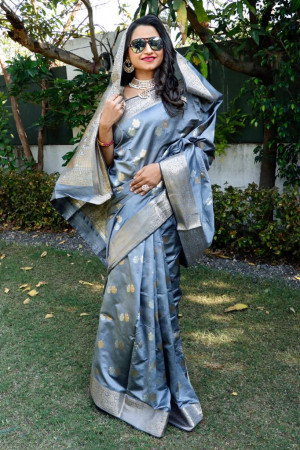 Gray color soft lichi silk saree with silver and golden zari weaving work