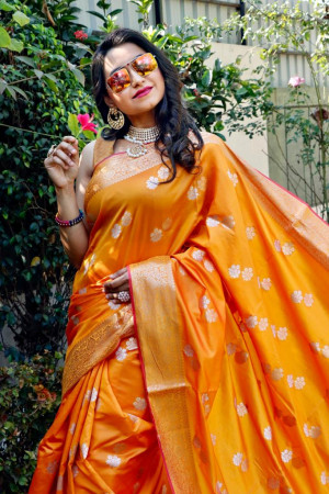 Orange color soft lichi silk saree with silver and golden zari weaving work
