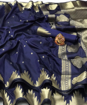Navy blue color lichi silk saree with golden zari weaving work