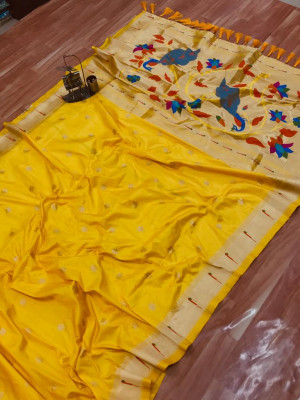 Yellow color paithani silk saree with zari weaving attractive pallu