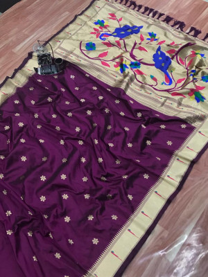 Magenta color paithani silk saree with zari weaving attractive pallu