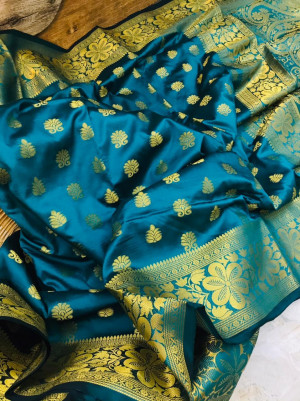 Firoji color lichi silk saree with zari weaving work