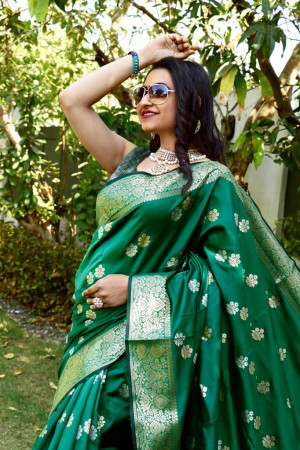 Green color soft lichi silk saree with silver and golden zari weaving work