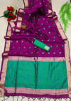Magenta color raw silk saree with weaving work