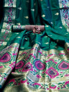 Rama green color soft banarasi silk saree with zari woven border