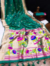 Rama green color paithani silk saree with zari woven work