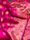 Rani pink color banarasi silk saree with weaving work