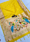 Yellow color paithani silk saree with weaving work