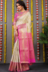 White color kanchipuram silk saree with zari weaving work