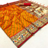 Orange color paithani silk saree with zari work and leheriya design