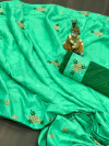 Sea green color soft dola silk saree with embroidery and stone work