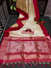 Beige color tussar silk saree with zari woven contrast border