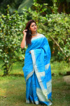 Firoji color raw silk saree with woven design