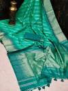 Sea green color tussar silk saree with zari woven work