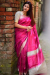 Rani pink color raw silk saree with woven design